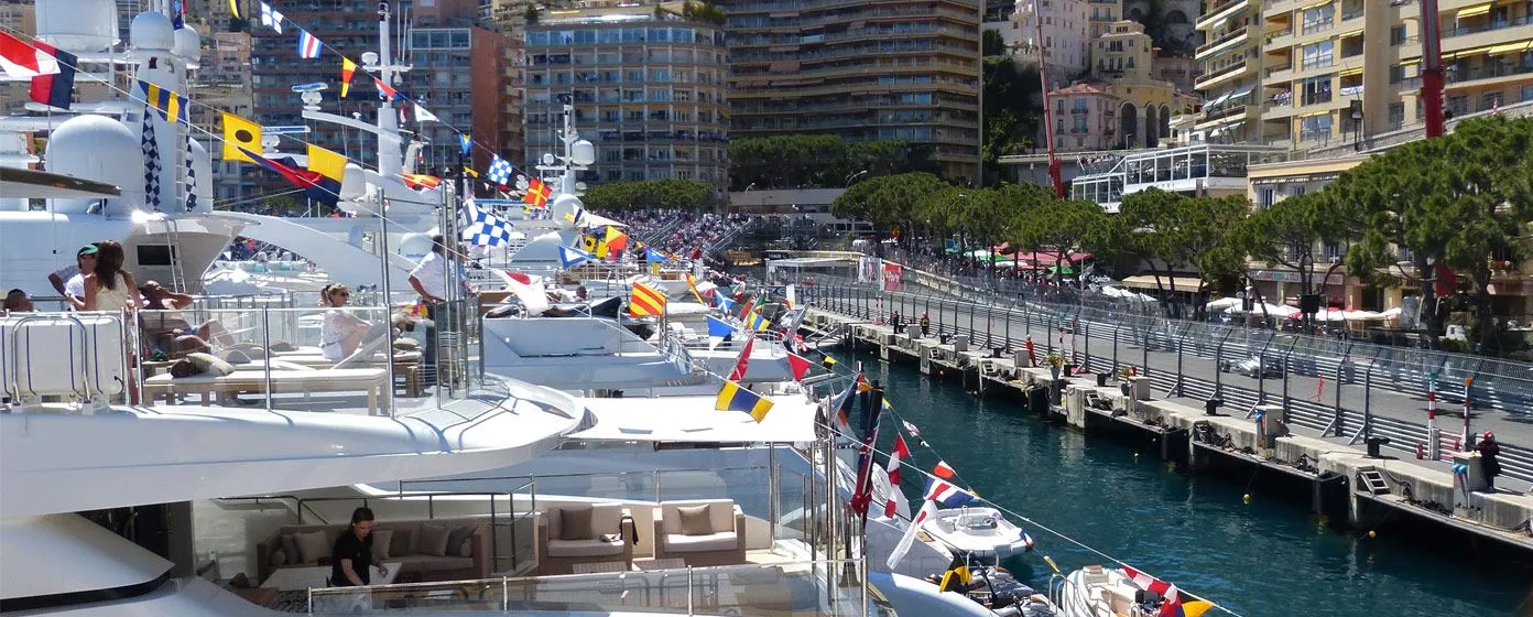 Superyacht passengers watching the Grand Prix